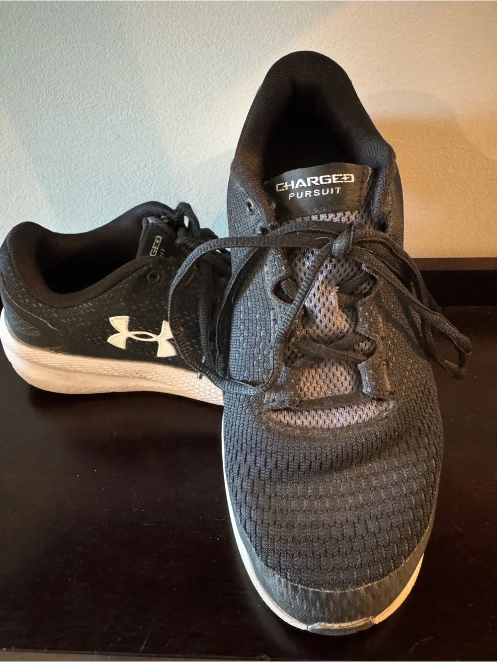 Youth 7 Under Armour Charged Pursuit Black sneakers